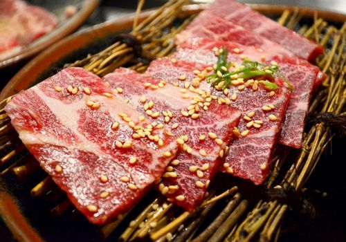Raw Beef Slices with Sesame Oil and Seeds