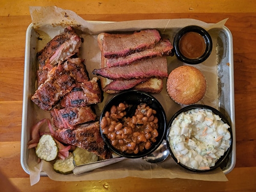 a large bbq meal with brisket