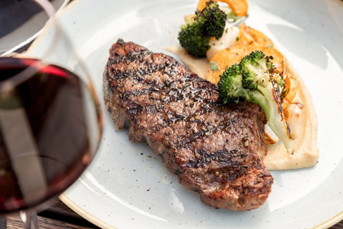 steak dinner with wine