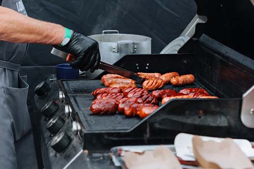 sausages on a grill