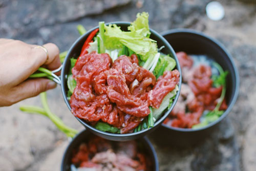 Asian dish with fresh meat and lettuce