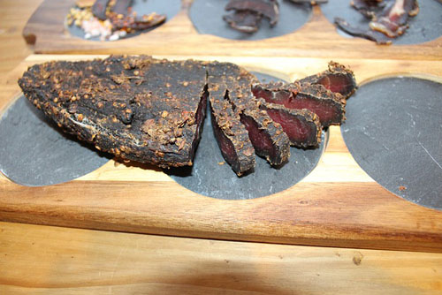 Dried Beef On Wooden Board