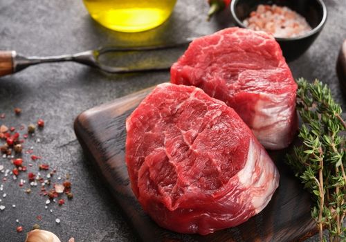 Raw Filet Mignon Steaks with Herbs