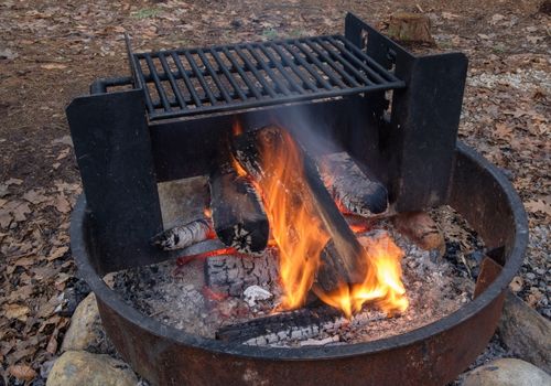 Metal Grill Over A Campfire