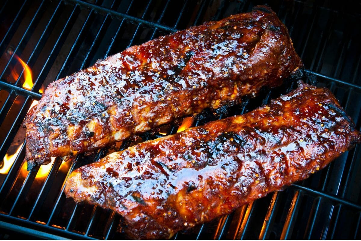 Rack of Baby Back Pork Ribs on BBQ Grill