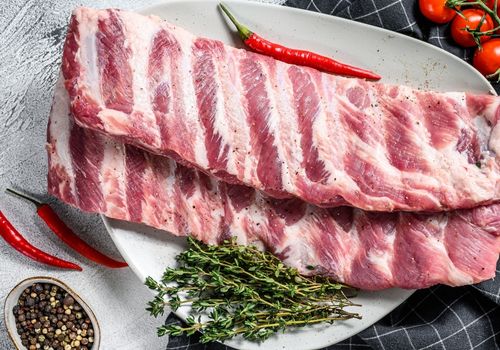 Fresh Raw Lamb Spare Ribs with Spices and Herbs
