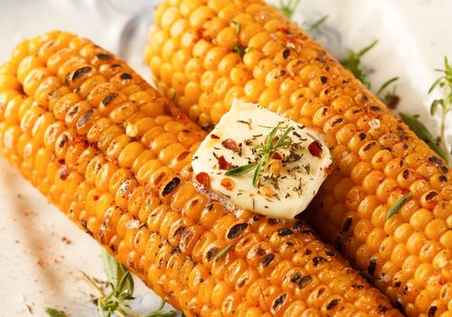 Grilled Corn with Butter and Aromatic Herbs