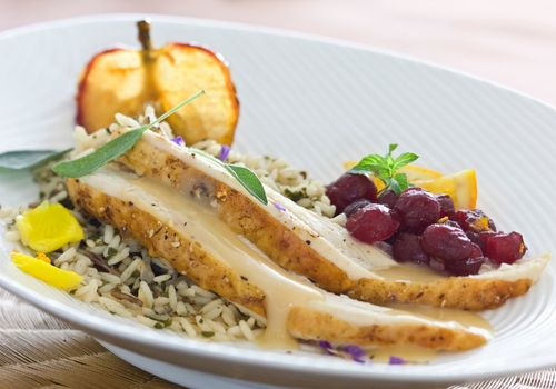 Turkey Slices with Pan Gravy, Wild Rice , Cranberries and Candy Apple