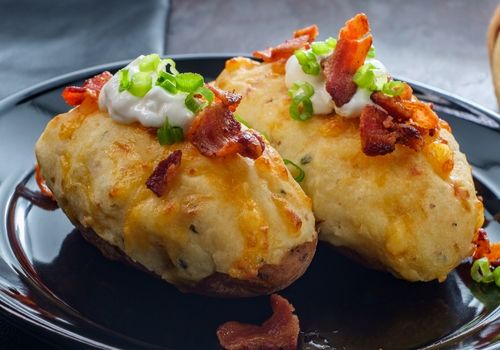 Baked Potato with Cheese, Bacon, Scallions, and Sour Cream