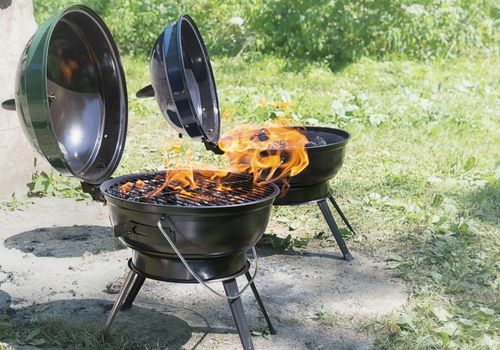 Flames Burning on Portable BBQ Grill