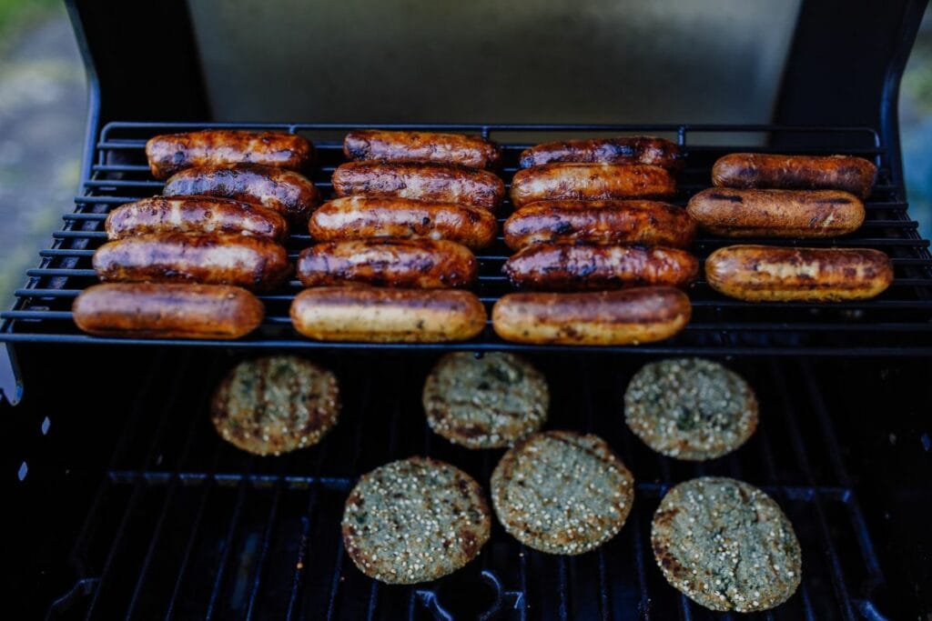 Sausages and Burger Patty on the Grill