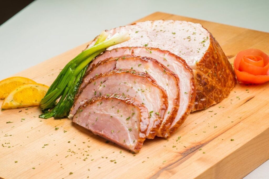 Sliced Pork Ham with Orange Slices and Spring Onions