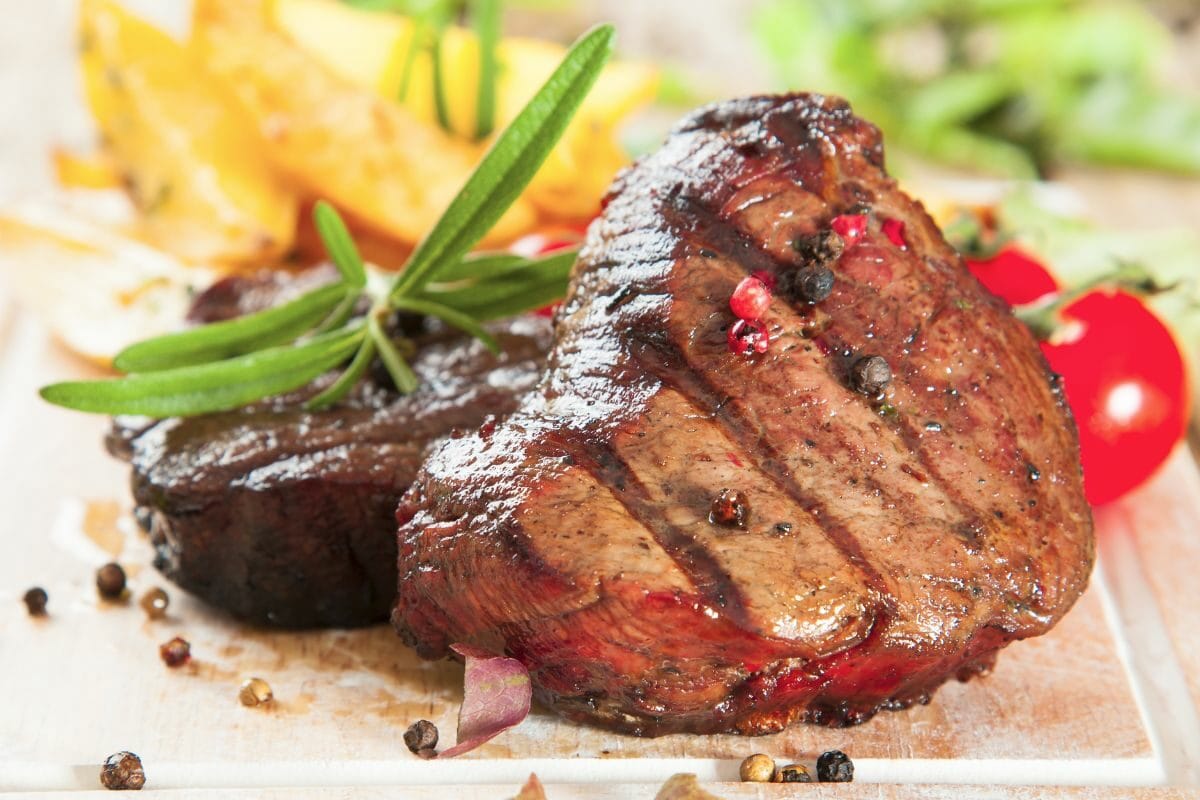 Delicious Beef Steak with Herbs and Tomatoes