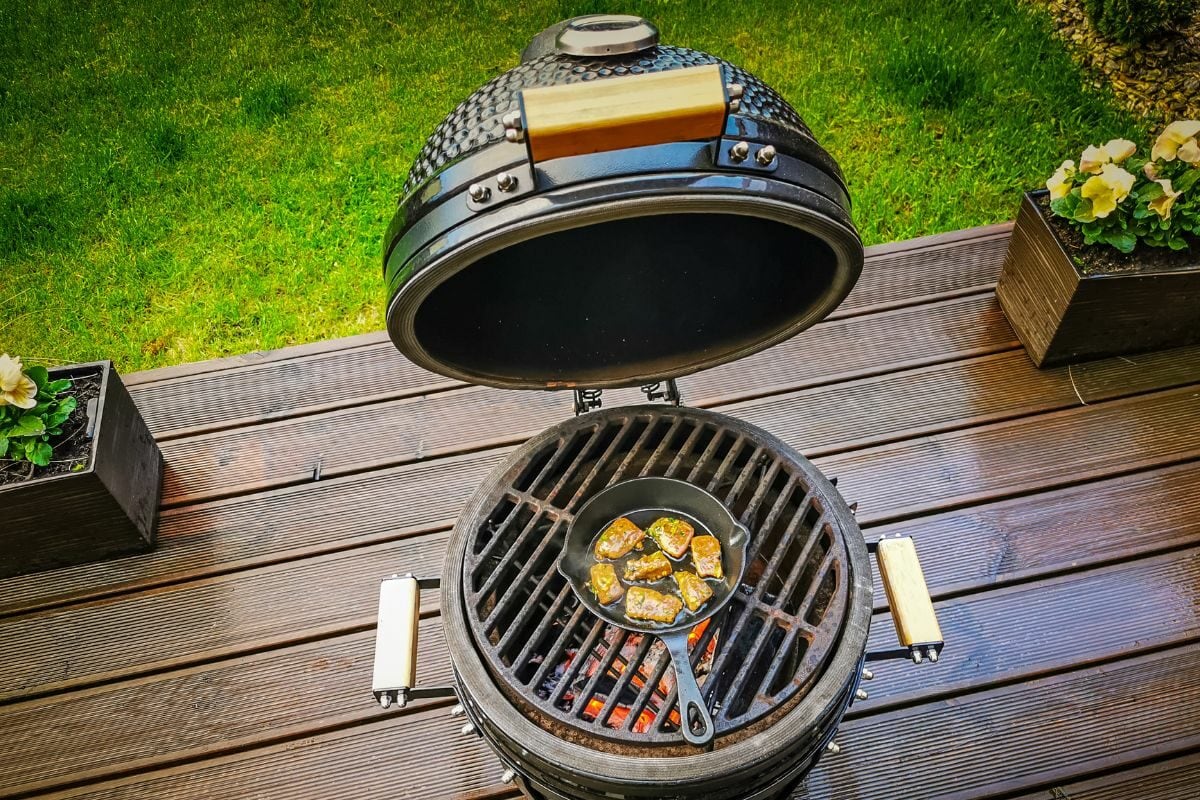 Black Kamado Type BBQ Grill and Pan with Roasted Beef