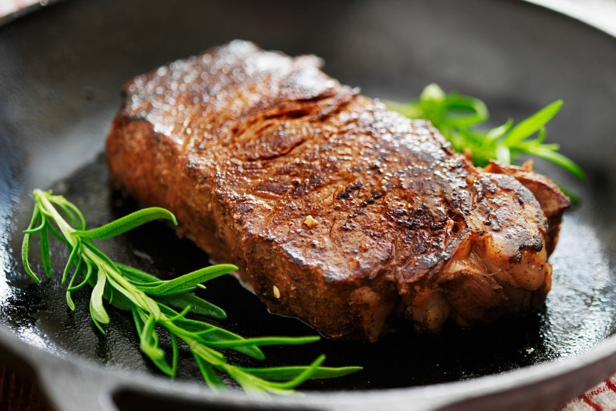 New York Strip Steak with Rosemary Leaves