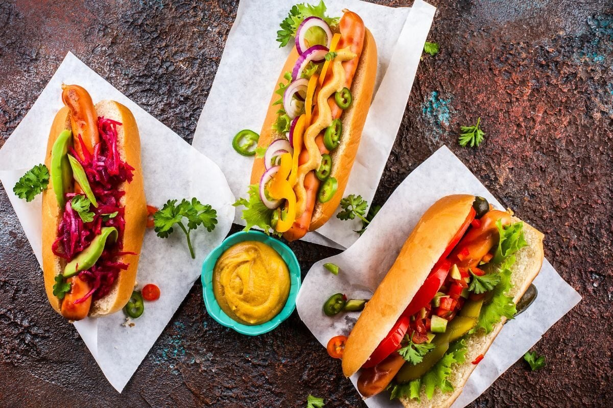 Variety of Delicious Hot Dogs with Mustard Dip